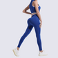 A seamless round neck sleeveless zip bra and sports pants two-piece set