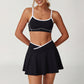 Wholesale sports color-blocked bra + A-line skirt 2-piece set