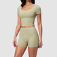 Wholesale Women's Seam-Detail Short Sleeve Crop Top + High-Waist Shorts Set – Butt-Lifting Yoga Gym Activeweare