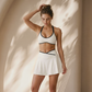 Wholesale Women's Naked Feel Color Block Sports Bra & Anti-Exposure High-Waist Mini Skirt Set
