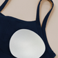 Wholesale Women's Padded Cami Bra +Hip-lift Cropped Pants Yoga Set