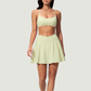 Wholesale Cross Straps Naked-Feel Sports Bra & Pleated Tennis Skirt Set