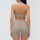 Halter-neck open-back sports bra + high-waisted shorts 2-piece set
