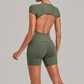Wholesale Women's Open-Back Pleated Yoga Set Short Sleeve Crop Top & Shorts with Chest Pad