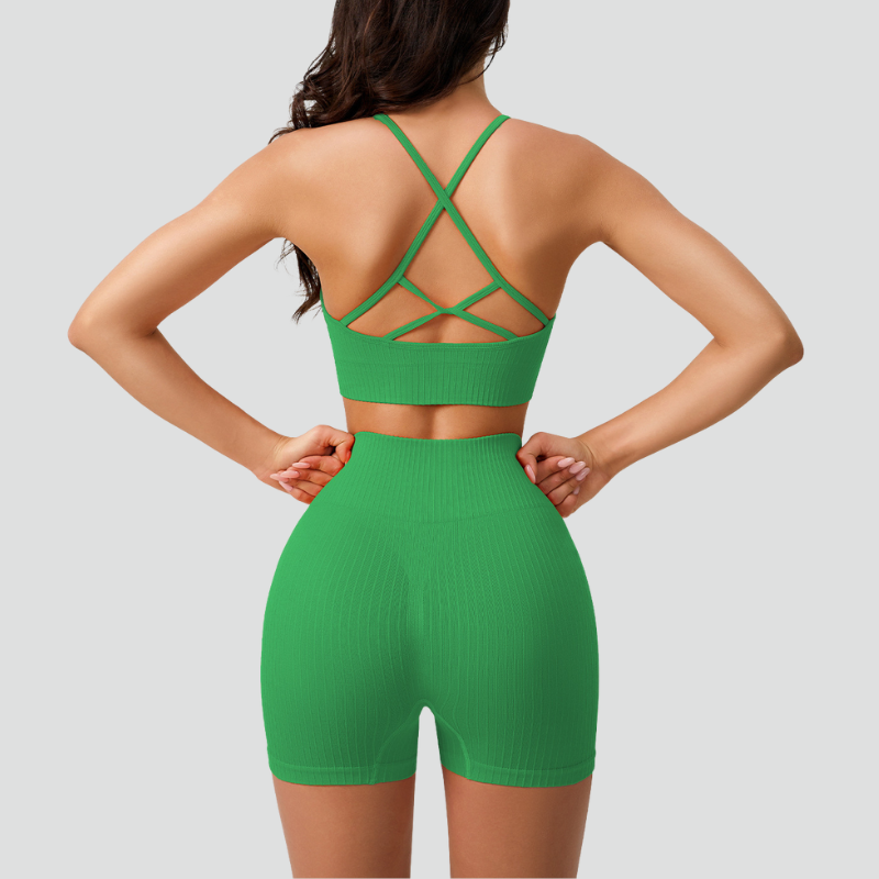 Women's thin strap sports bra and yoga shorts two-piece set.