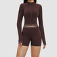 Wholesale color-blocked stand-collar zippered jacket + high-waisted tight shorts