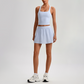 Wholesale Sleeveless Sports Top & Pleated Tennis Skirt Set – Quick-Dry Athletic 2-Piece with Built-In Shorts
