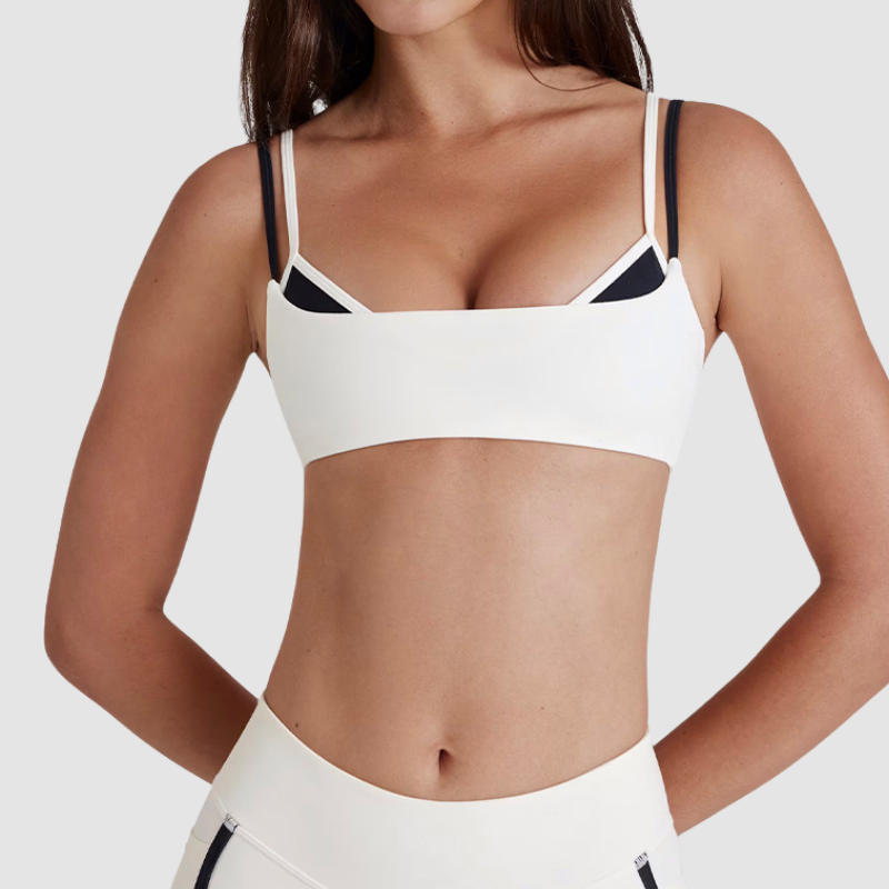 Faux two-piece color-blocked sports bra
