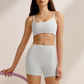Women's yoga tank top and white-trimmed running shorts two-piece set