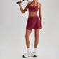 Wholesale Naked-Feel Sports Bra & Pleated Tennis Skirt Set – Quick-Dry Athletic 2-Piece with Built-In Shorts