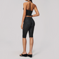 Wholesale Women's Deep V high-elastic polka-dot vest + high-waisted Capri Shorts Set