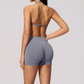 Wholesale Women's Seamless Yoga Set: Halter Open-Back Sports Bra & Shorts – Quick-Dry Lycra w/ Chest Pad