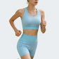 Wholesale Women's Seamless Yoga Set: Sports Bra & Capri Shorts – Body-Shaping Moisture-Wicking Fitness w/ Chest Pad