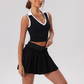 Wholesale Women's Halter Neck Sports Bra & Pleated Mini Skirt Set with Chest Pad