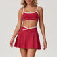 Wholesale sports color-blocked bra + A-line skirt 2-piece set