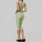 Wholesale Women's Bare-Feel Square Neck Yoga Jumpsuit with Chest Pad & Capri Shorts