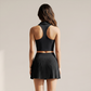 Wholesale Women's Polo Collar Fixed Cup Sports Bra & Anti-Exposure Pleated Skirt Tennis Set