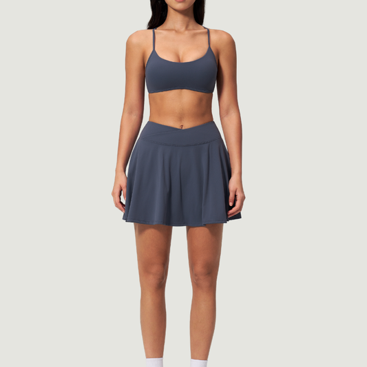 Wholesale Cross Straps Naked-Feel Sports Bra & Pleated Tennis Skirt Set