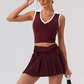 Wholesale Women's Halter Neck Sports Bra & Pleated Mini Skirt Set with Chest Pad