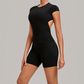 Wholesale Women's Open-Back Pleated Yoga Set Short Sleeve Crop Top & Shorts with Chest Pad
