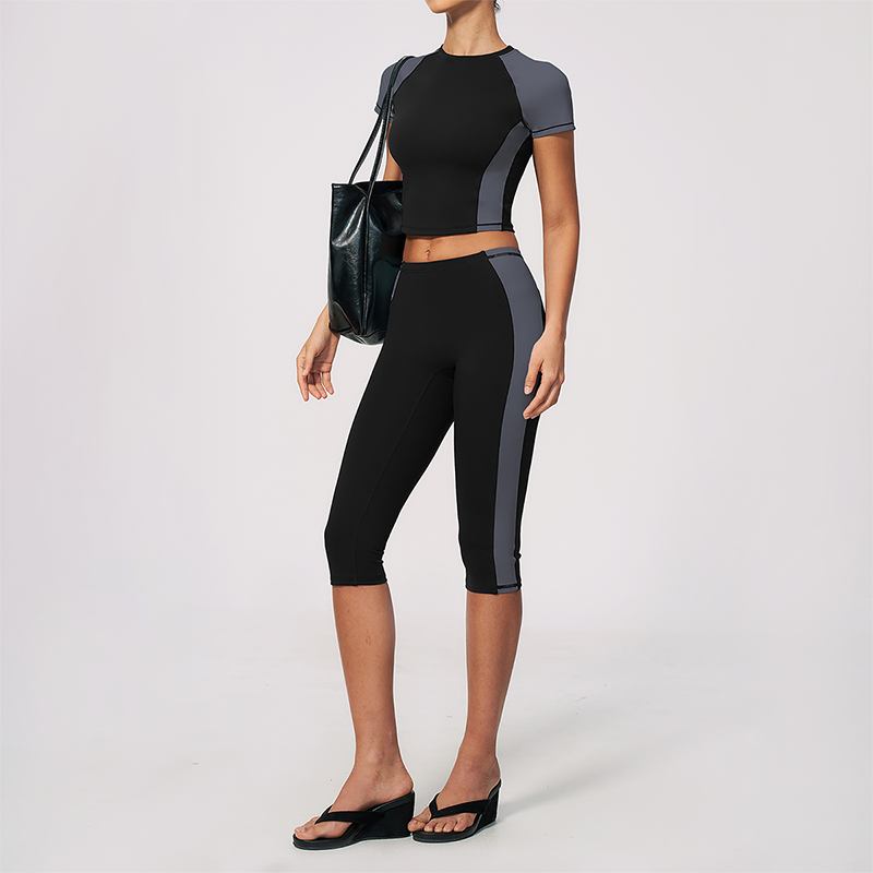 Wholesale Women's Colorblock Bare-Feel Yoga Set Short Sleeve Top & Capri Pants