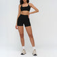 Halter-neck open-back sports bra + high-waisted shorts 2-piece set
