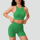 Women's thin strap sports bra and yoga shorts two-piece set.