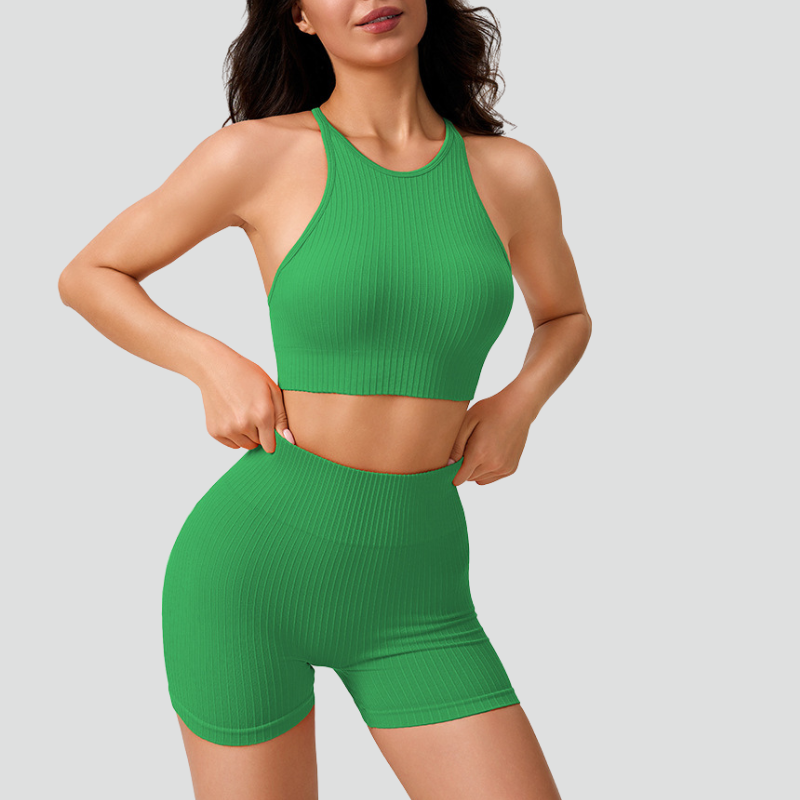 Women's thin strap sports bra and yoga shorts two-piece set.
