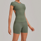 Wholesale Women's Open-Back Pleated Yoga Set Short Sleeve Crop Top & Shorts with Chest Pad