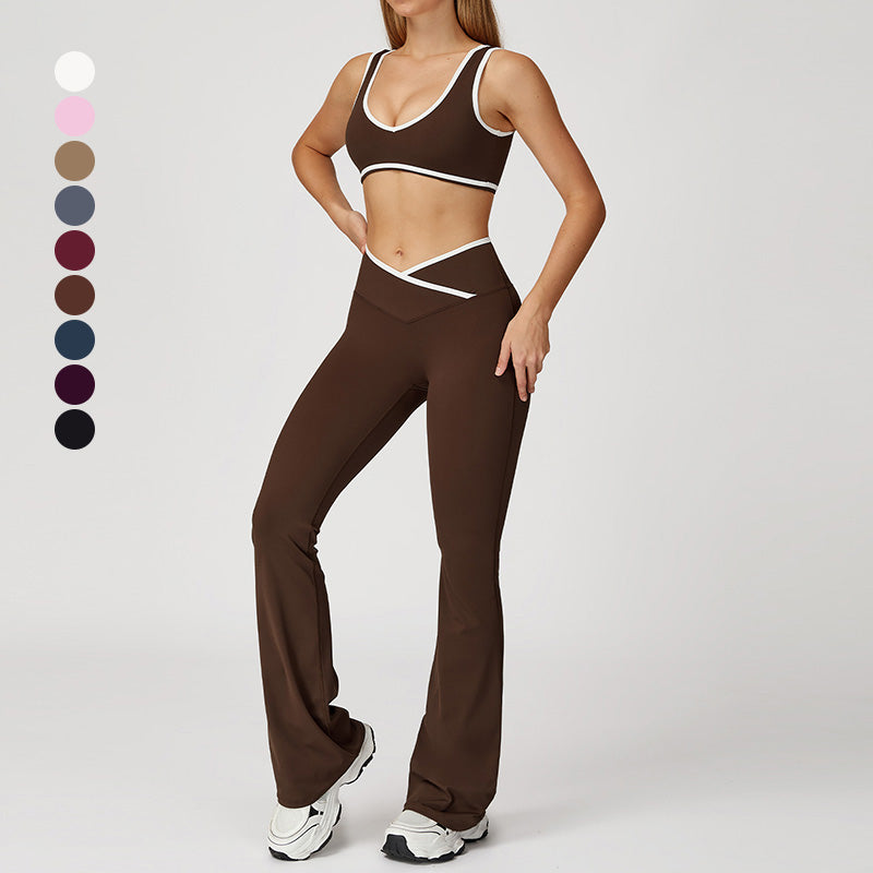 Reggiseno sportivo a colori contrastanti pantaloni a vita alta in croce