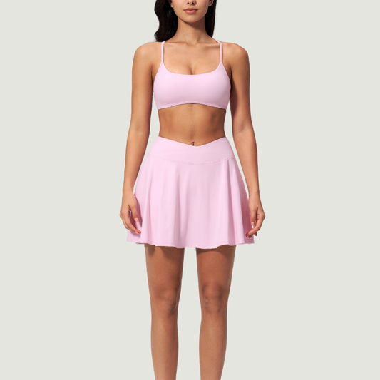 Wholesale Cross Straps Naked-Feel Sports Bra & Pleated Tennis Skirt Set