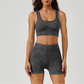 Women's shockproof sports bra and high-waisted running shorts two-piece set.