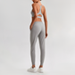 Wholesale Naked-Feel Open-Back Sports Bra & High-Waist Jogger Pants Set – Sculpting Yoga 2-Piece
