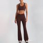 Wholesale Women's Open-Back Long Sleeve Crop Top & High Waist Leggings Set with Chest Pad