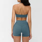 Halter-neck open-back sports bra + high-waisted shorts 2-piece set