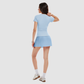 Wholesale Women's V-Neck Open-Back Short Sleeve Top & Pleated Skirt Set