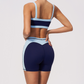 Wholesale Women's Colorblock Bare-Feel Yoga Set Sports Bra & Shorts w/ Chest Pad