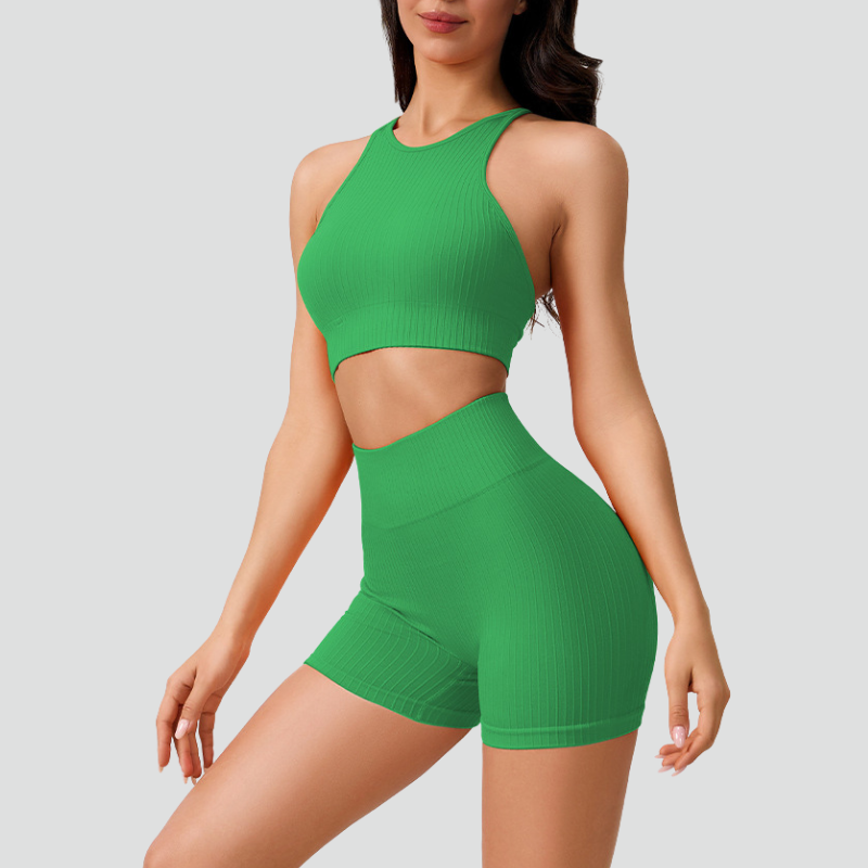 Women's thin strap sports bra and yoga shorts two-piece set.