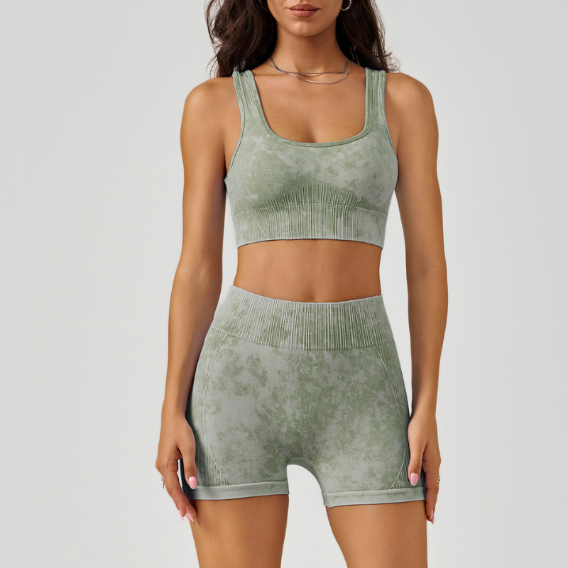 Women's shockproof sports bra and high-waisted running shorts two-piece set.