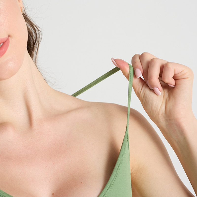 Women’s padded crossover strap bodysuit