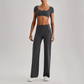 Wholesale Women's Short Sleeve Exposed Back Bra+Naked Feel Straight Leg Pants Yoga Set