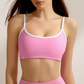 Women's yoga tank top and white-trimmed running shorts two-piece set