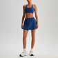 Wholesale Naked-Feel Sports Bra & Pleated Tennis Skirt Set – Quick-Dry Athletic 2-Piece with Built-In Shorts