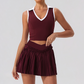 Wholesale Women's Halter Neck Sports Bra & Pleated Mini Skirt Set with Chest Pad