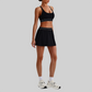 Wholesale Naked-Feel Sports Bra & Pleated Tennis Skirt Set – Quick-Dry Athletic 2-Piece with Built-In Shorts