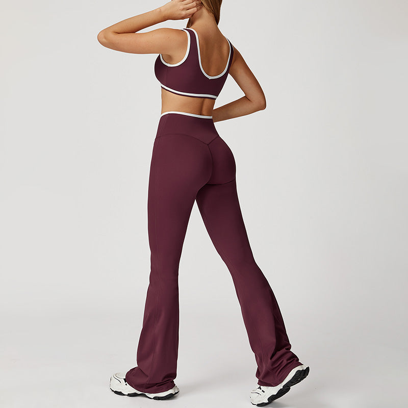 Reggiseno sportivo a colori contrastanti pantaloni a vita alta in croce