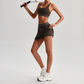 Wholesale Naked-Feel Sports Bra & Pleated Tennis Skirt Set – Quick-Dry Athletic 2-Piece with Built-In Shorts
