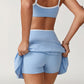 Wholesale sports color-blocked bra + A-line skirt 2-piece set