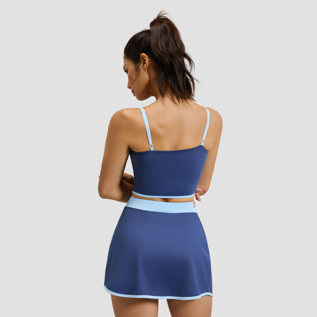Wholesale Women's Linear Design Sports Bra & Mini Skirt Yoga Set w/ Chest Pad