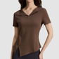 Wholesale Women's Lapel Collar Yoga Short-Sleeve Top with Side Slit Hem